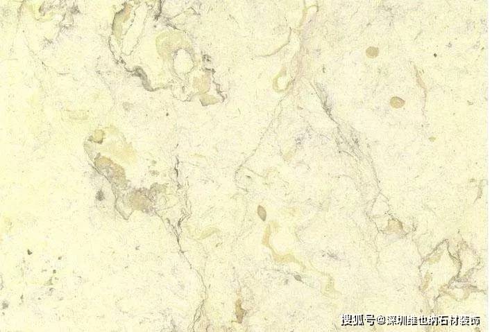 该石属云石,有着金花米黄的某些特征,如底色偏黄,花纹类似,有纹路