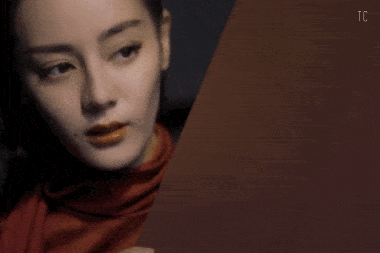 迪丽热巴时尚新封面曝光 明黄色旗袍显妖娆身段