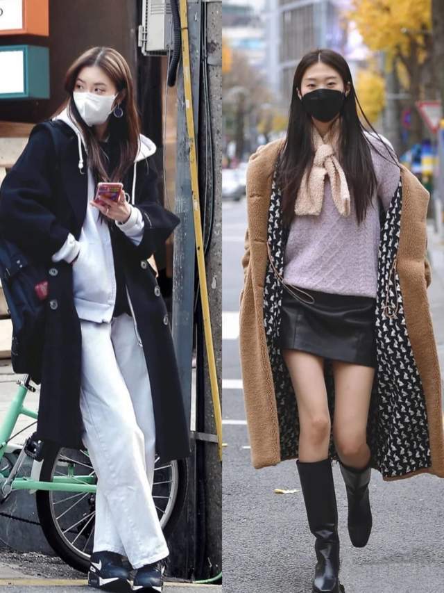 白色双排扣风衣叠穿黑色针织衫,蓝色直筒牛仔裤衔接黑色短靴,女神范儿