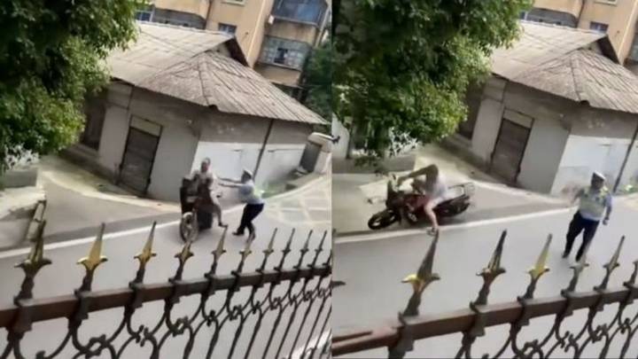 交警遇男子冲卡将其推下坡事件,你怎么看?
