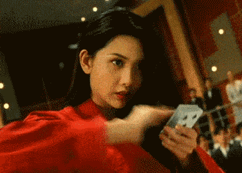 03 片名:《赌神2》 邱淑贞一袭红衣亮相, 坐在赌桌上双腿一收, 将