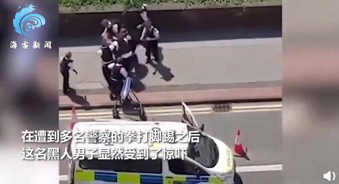 白人|8名英国白人警察围殴黑人男子 疑其携武器却只搜出伞