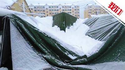 车库|呼伦贝尔北部林区天降大雪 有市民家车库帐篷被雪压塌