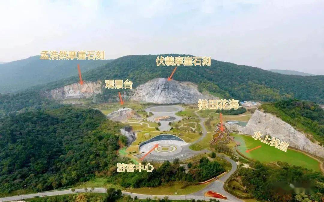 一尊巨大而庄严的伏羲摩崖石刻 旁边是孟浩然摩崖石刻 豪放不羁的
