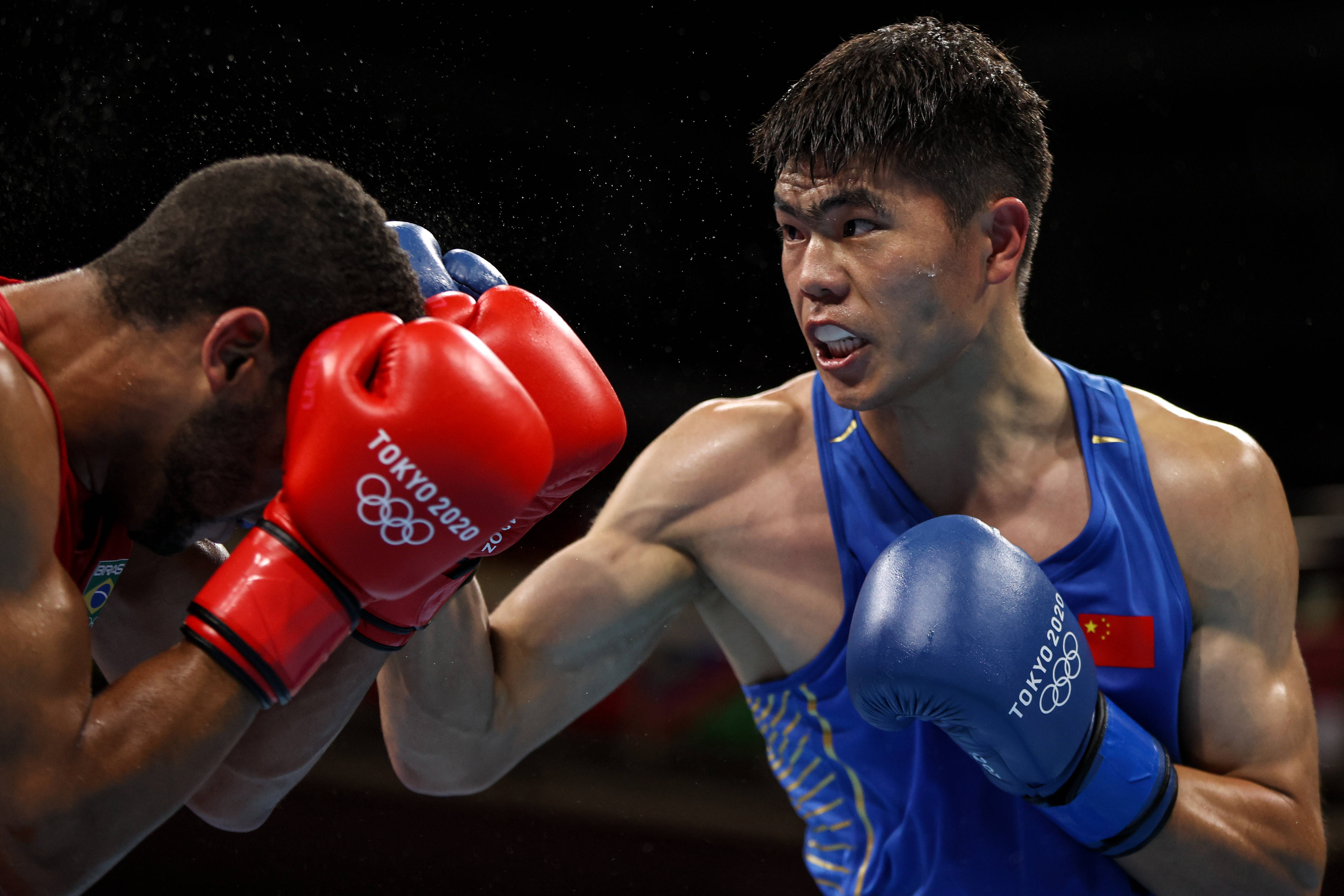 拳击—男子69-75公斤级:中国选手托合塔尔别克·唐拉提汗无缘八强