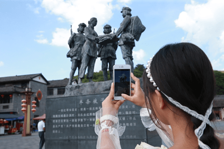 沙洲村:从"半条被子"到"云端日子" ——中国电信云端网络赋能乡村振兴