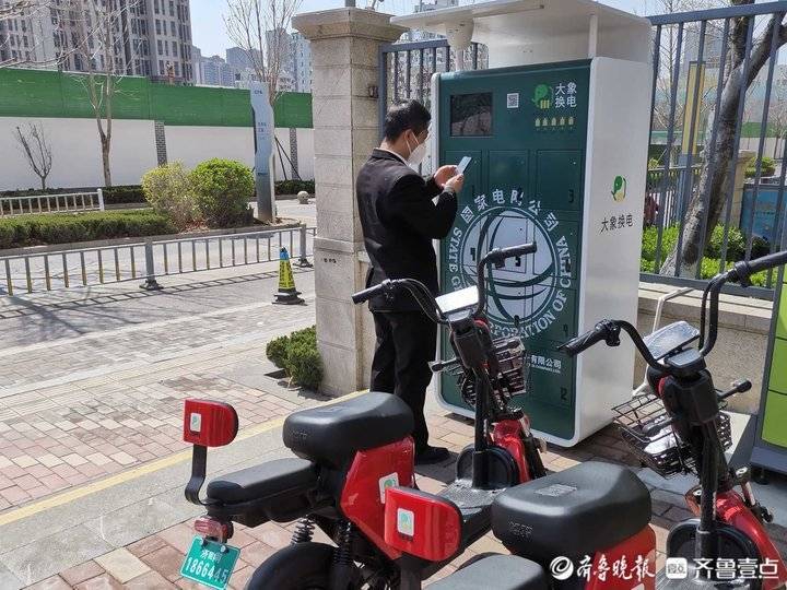 迎来"以换代充"时代,济南街头智能换电柜引关注_电动车_充电_小区