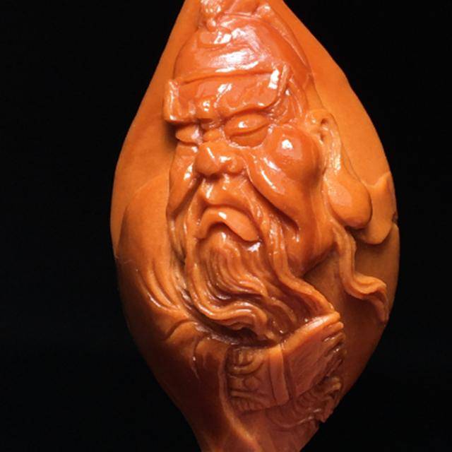 盘玩橄榄核多年的你还是无法辨别机雕还是手工其实方法很简单