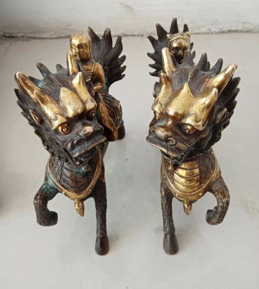 铜鎏金麒麟送子摆件一对精品赏析