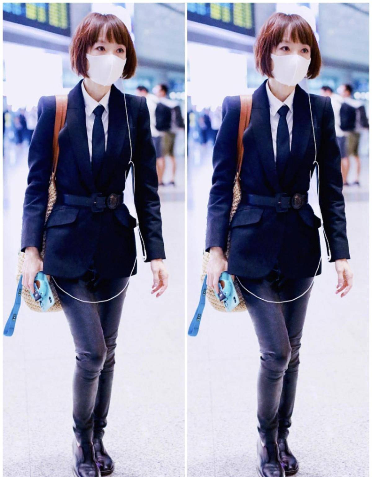 因为|鲁豫真是瘦得过分了，西装系了扣还是松垮垮，好在剪得短发挺显嫩