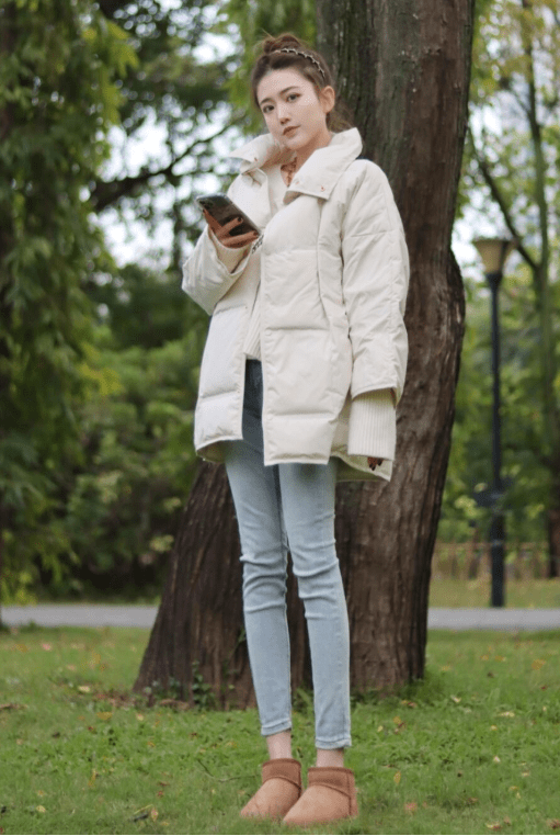 黑色 今年流行“羽绒服+小脚裤”，时髦显瘦又保暖，轻松美出新高度