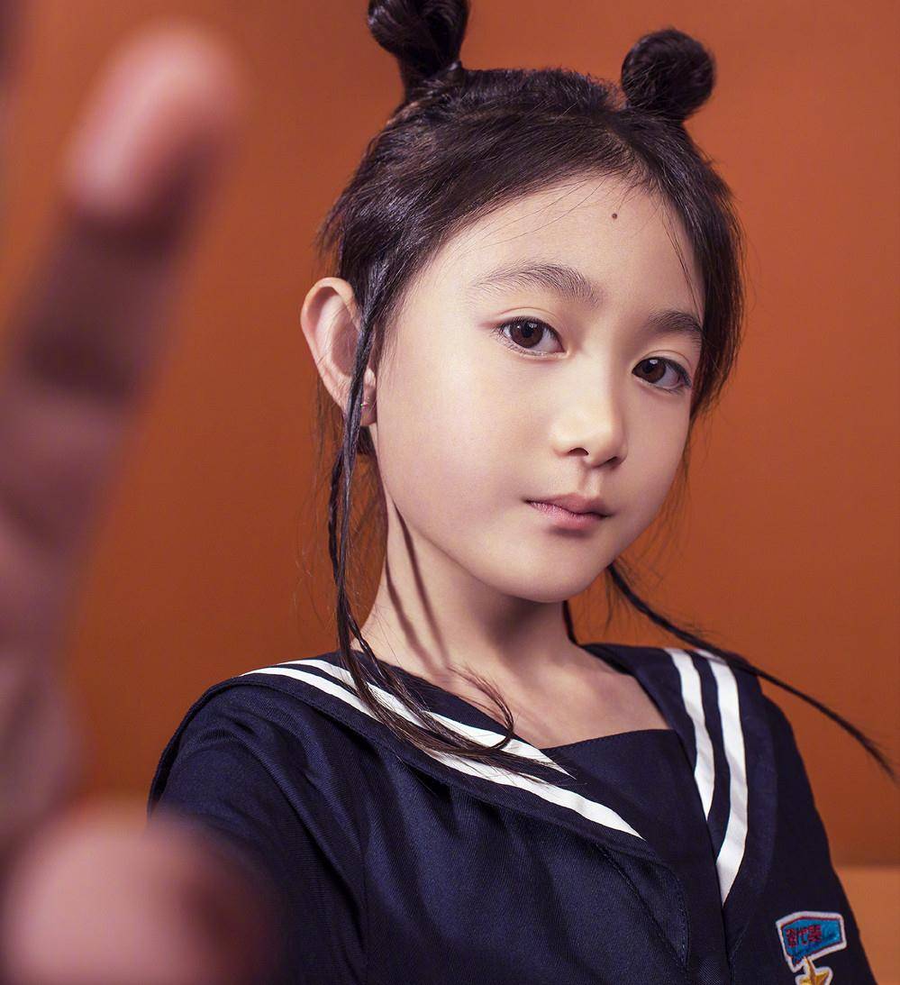 9岁奥利变化有点大,脸型和妈妈粘贴复制_遗传_孩子_影响