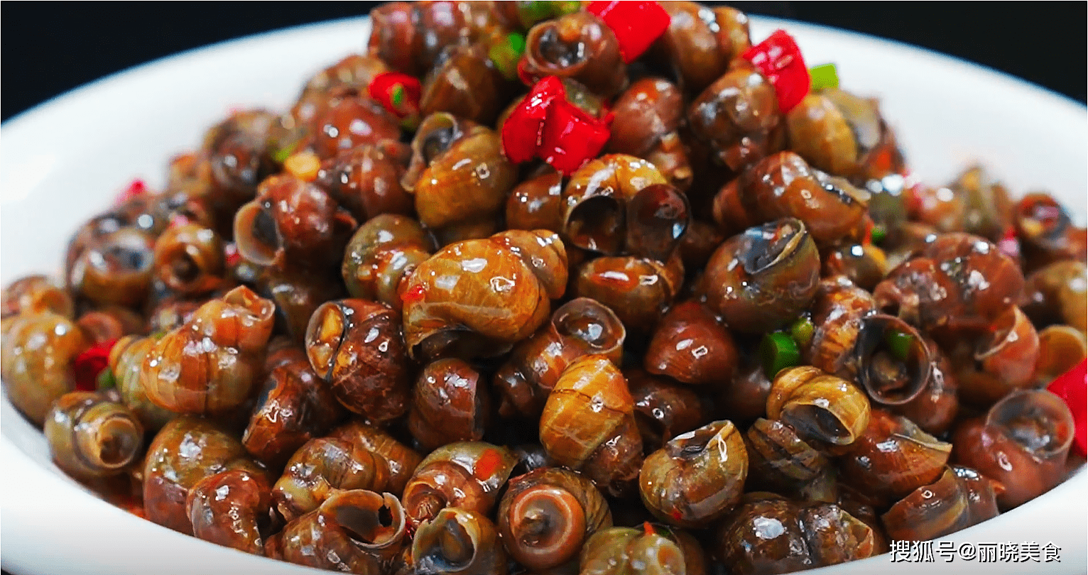 爆炒螺蛳6,汤汁煮到浓稠的时候 然后再放入煮好的花蛤,翻炒片刻,使