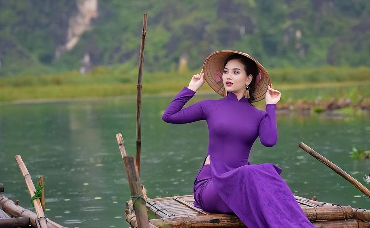 越南第一夫人美炸了!穿罕见紫色奥黛亮相老挝,雍容华贵很旺夫美爆了!