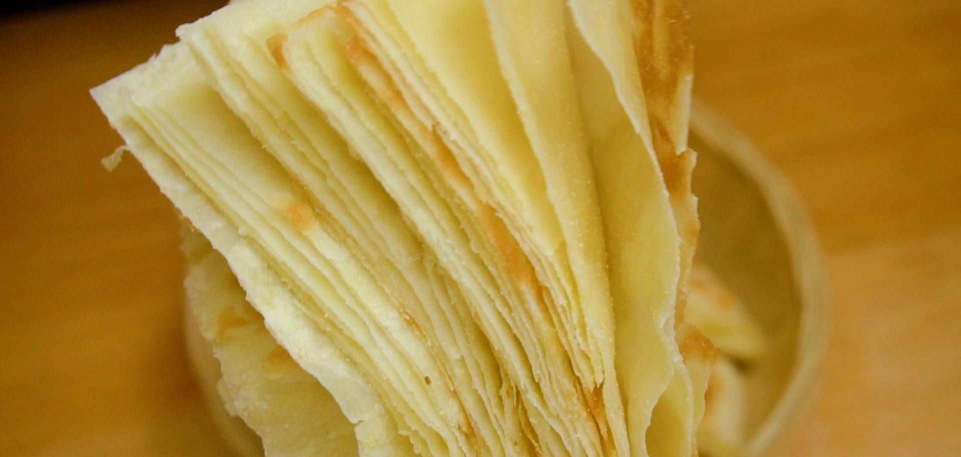 就是烙的千层饼里面的层次不明显容易粘连一块