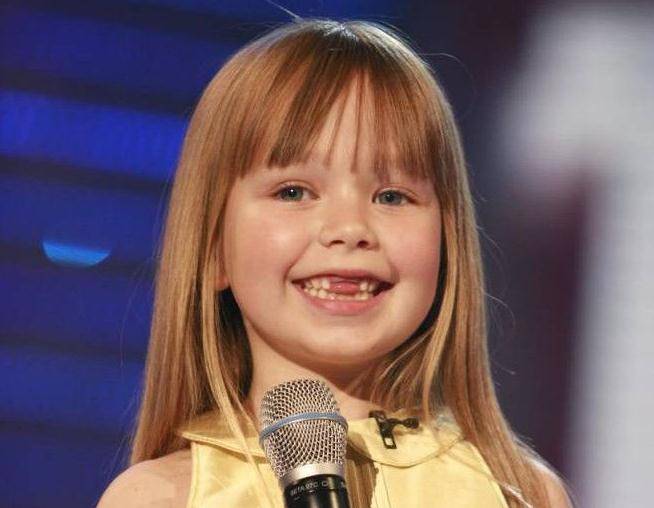 6岁天籁美声换牙萌样爆红,14年后变金发蓝眼美女_got_康妮塔波特_气质