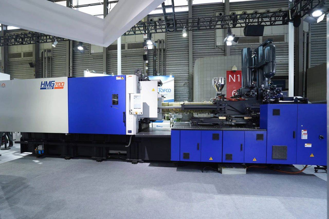 镁资讯:海天金属—全方位压铸解决方案及镁合金注射成型机"亮相"_一体