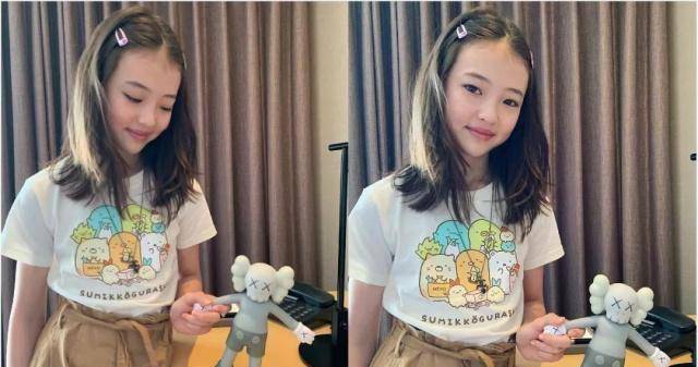 搭配蓝色牛仔裤随性又chic▼炎炎夏日可以像ellagross这样扎一个丸子