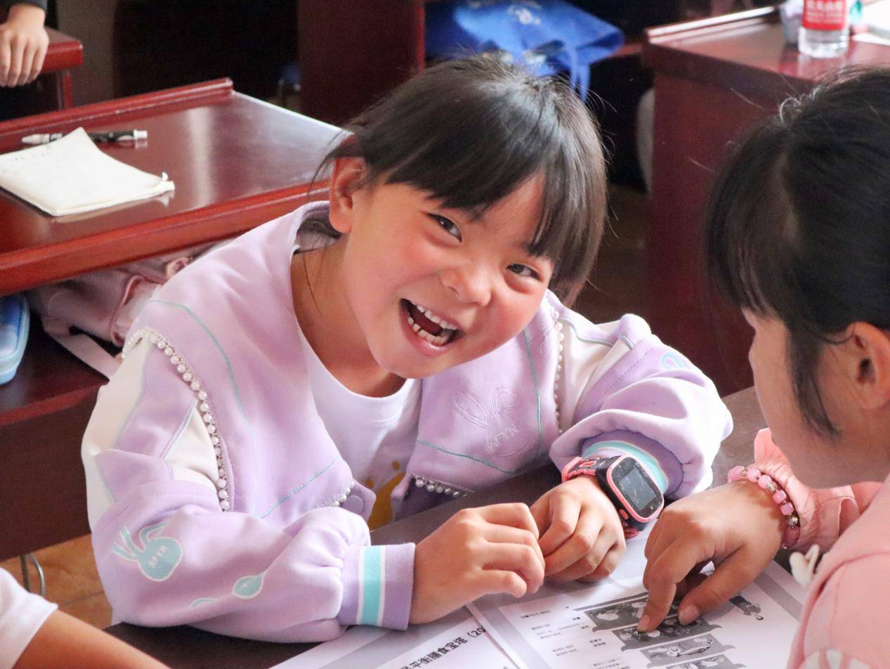 "参加夏令营的四年级学生周紫阳高兴地说.