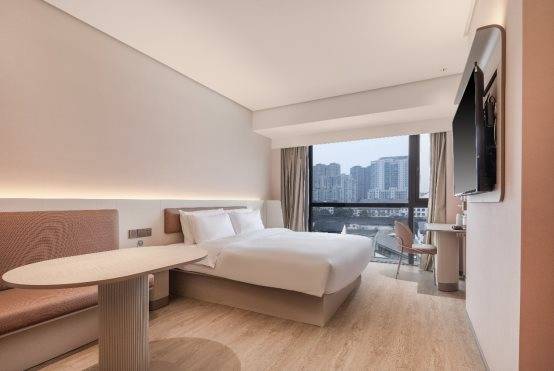 不再拘泥于以往商旅风格的简单色彩搭配设计,汉庭3.