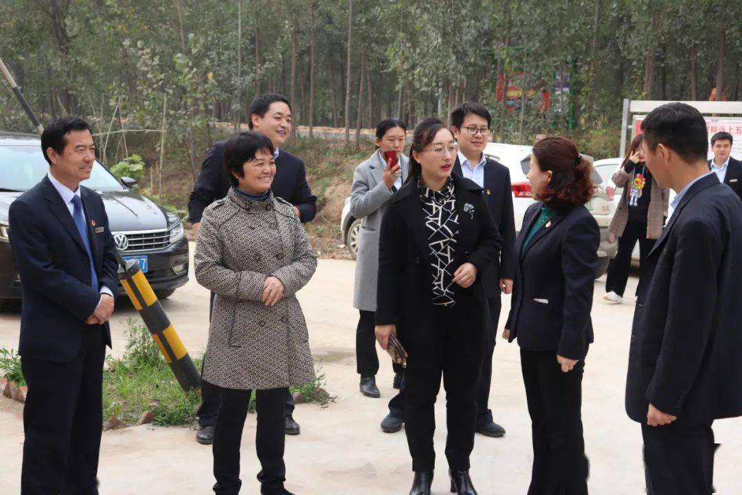 县委组织部副部长冯晓燕,商河农商银行党委委员李伍艳, 商河农商银行