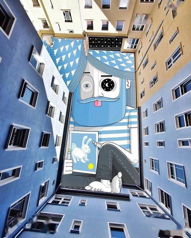 法国艺术家仰望天空的创意涂鸦