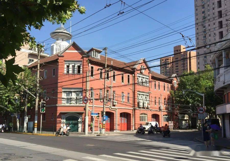 愚园路的这幢大楼前身原来是一起来看