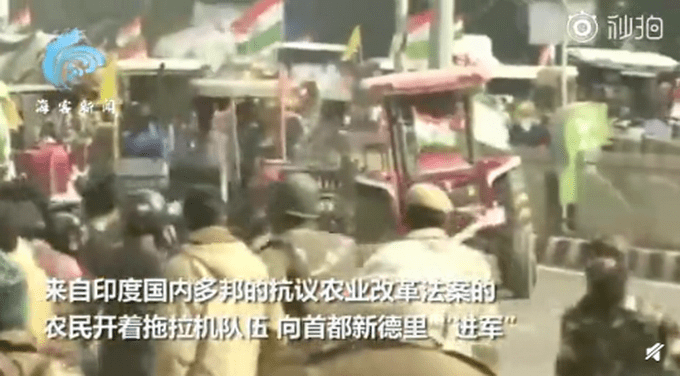 印度十万农民开拖拉机游行（图）