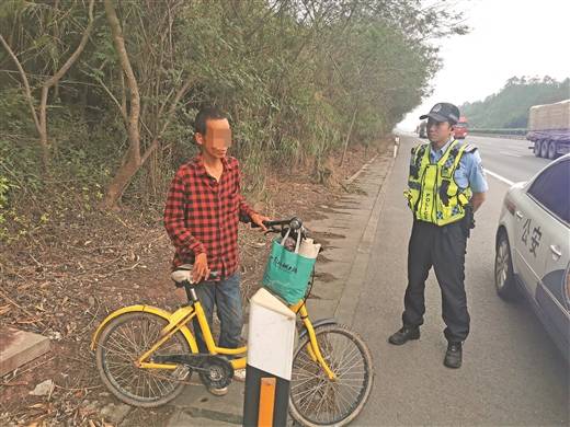 男子騎共享單車上高速公路_林先生