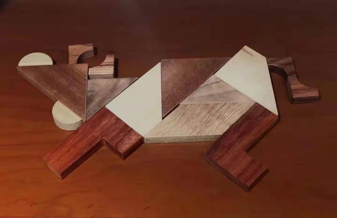 用益智图拼出的不同形态的牛一场"穿越"时光的传承上世纪二十年代末