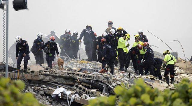 热带风暴将至美坍塌公寓剩余楼体将被拆除搜救暂停仍有124人失联