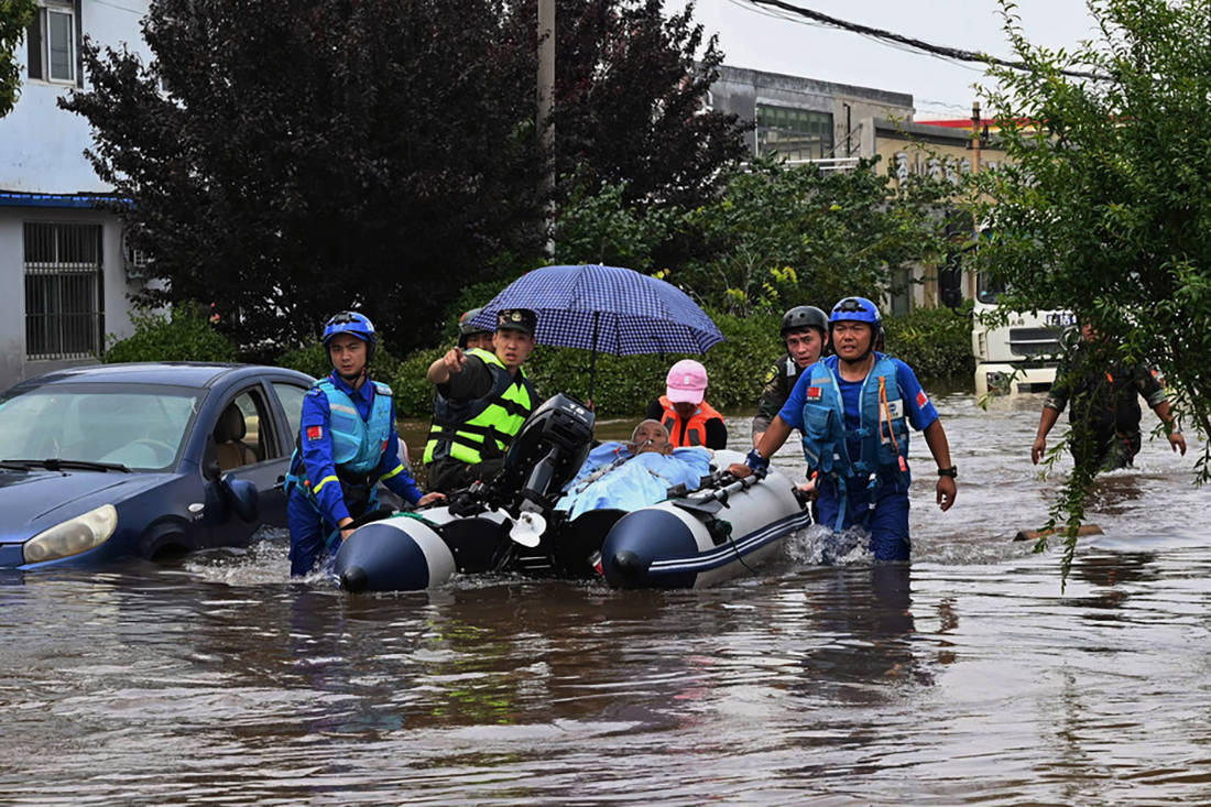 一周图片|致敬!台风,洪水中的每一位"平民英雄"