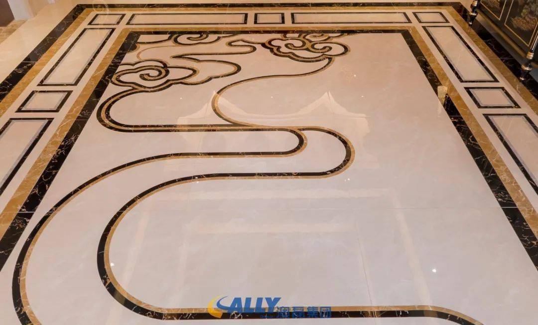 佛龛空间中,地面祥云的水刀拼花,和电梯间门上的镂空祥云,是一大设计