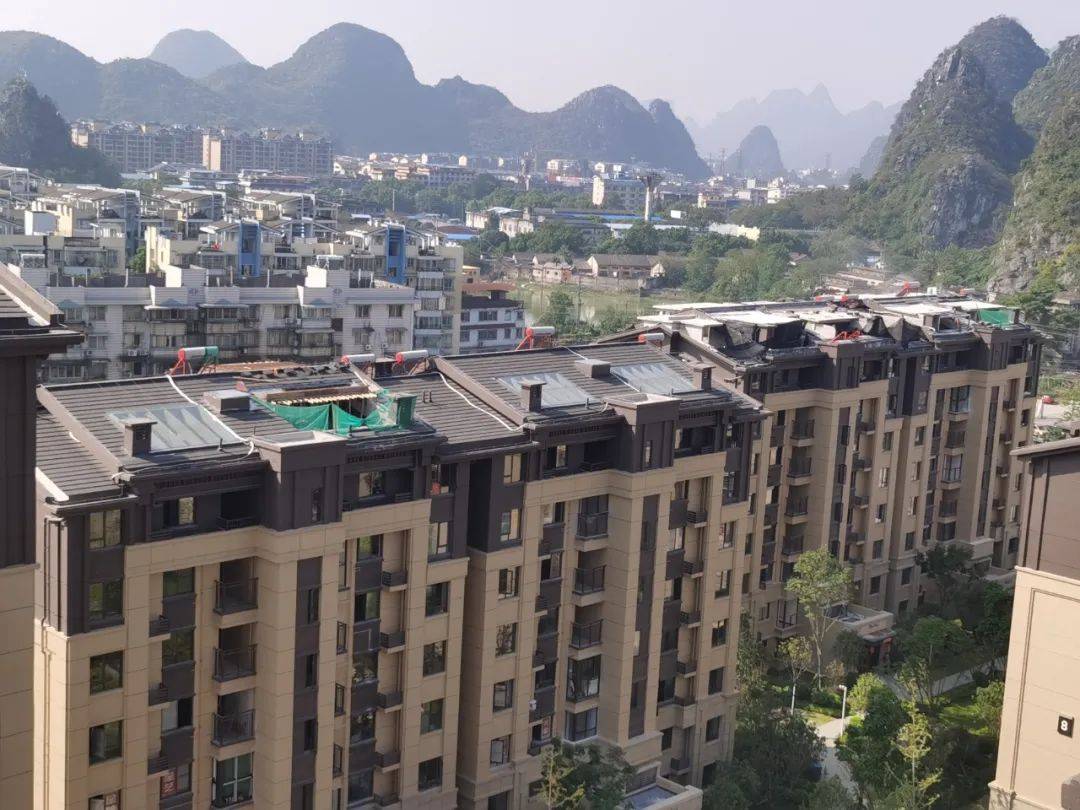 桂林一小区21户顶楼住户"组团违建"!相关部门介入调查