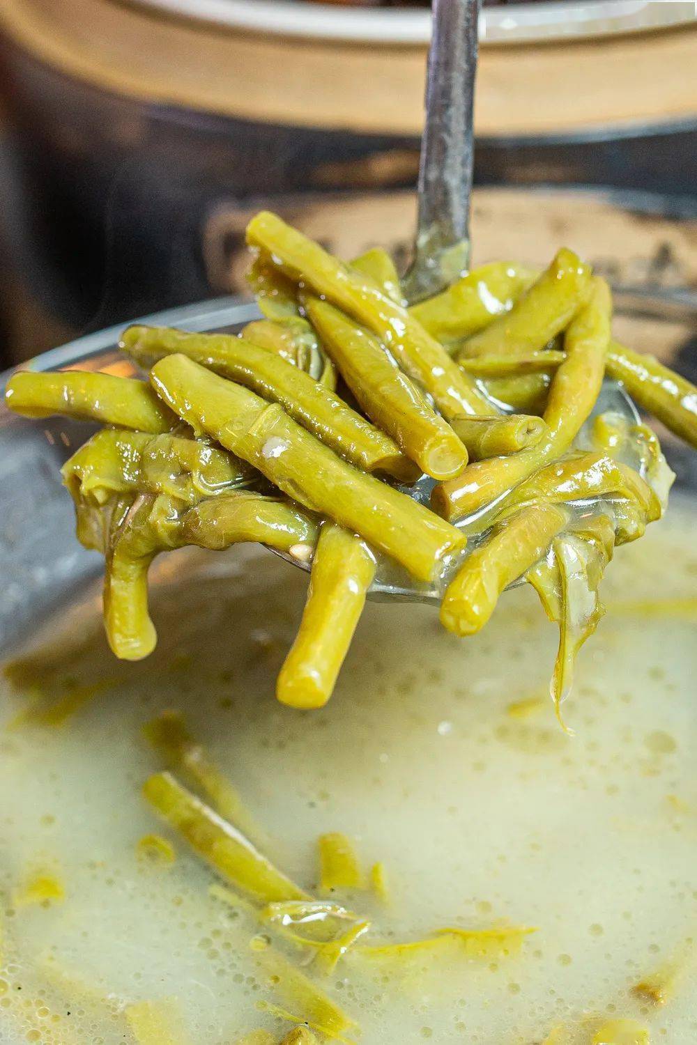 米汤煮豆角 摄影:黄逊2008年,李强开第二家店,并花800元在网上征集