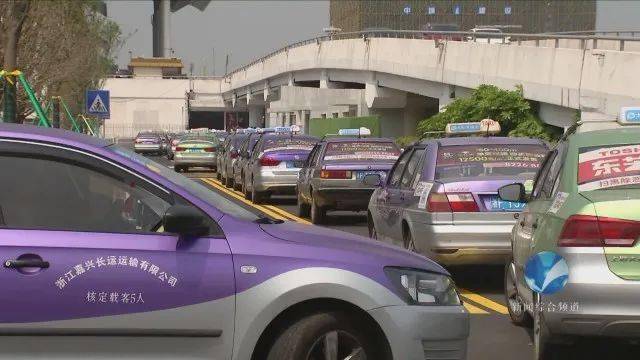 防疫进行时嘉兴市加强出租车防疫管控让乘客坐上放心车
