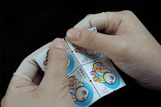 年册暴力撕票分撕邮票是件专业活儿