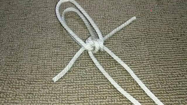 抬杠结相传由古代挑山工所发明的一种抬扣易结易解