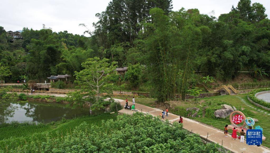 海南五指山:美丽乡村迎客来【图】_毛纳_水满乡_游客