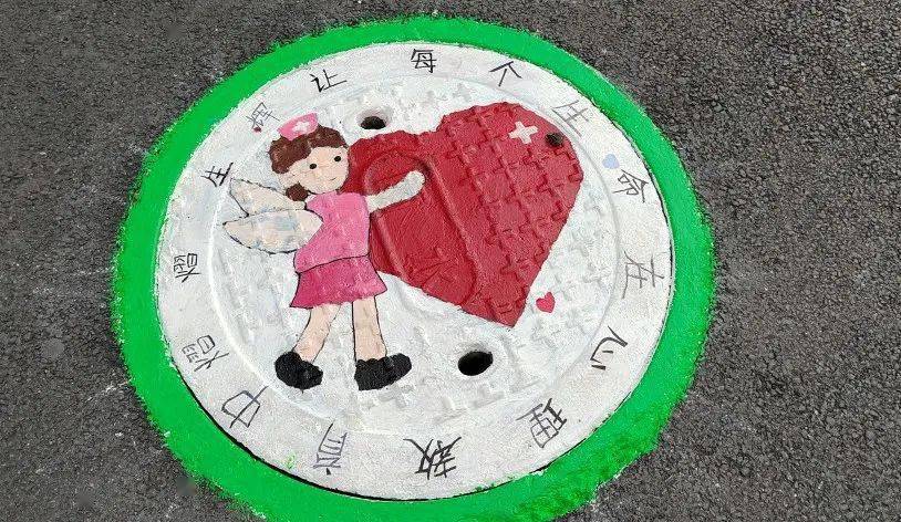 飞扬心声井上添花筠连中学举办校园创意井盖涂鸦设计活动