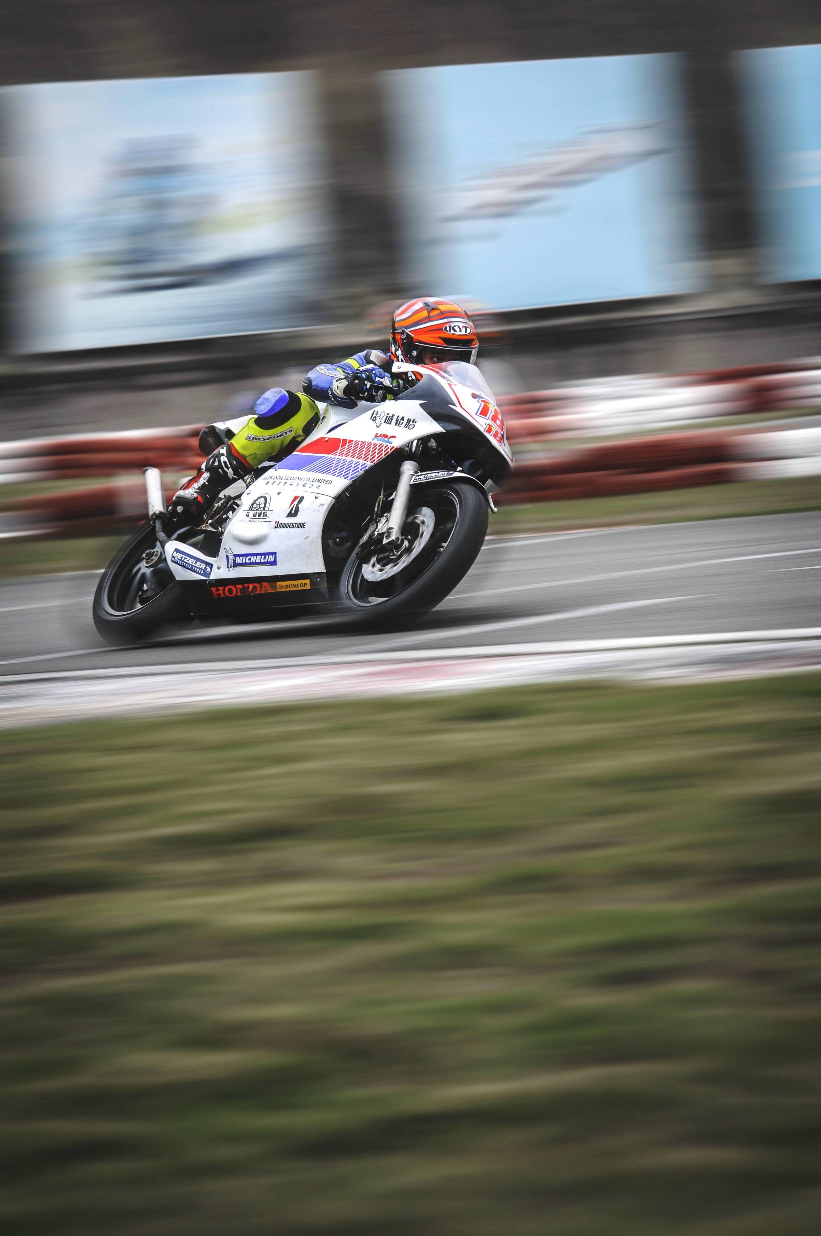 的胡通明,在去年的两场比赛(大湾区摩托车大赛   三水森林赛车会摩托