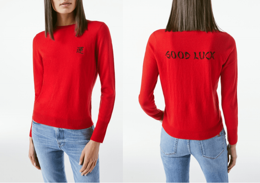 "good luck"和"運"的字样被印在卫衣最醒目的位置上,象征着对2022的