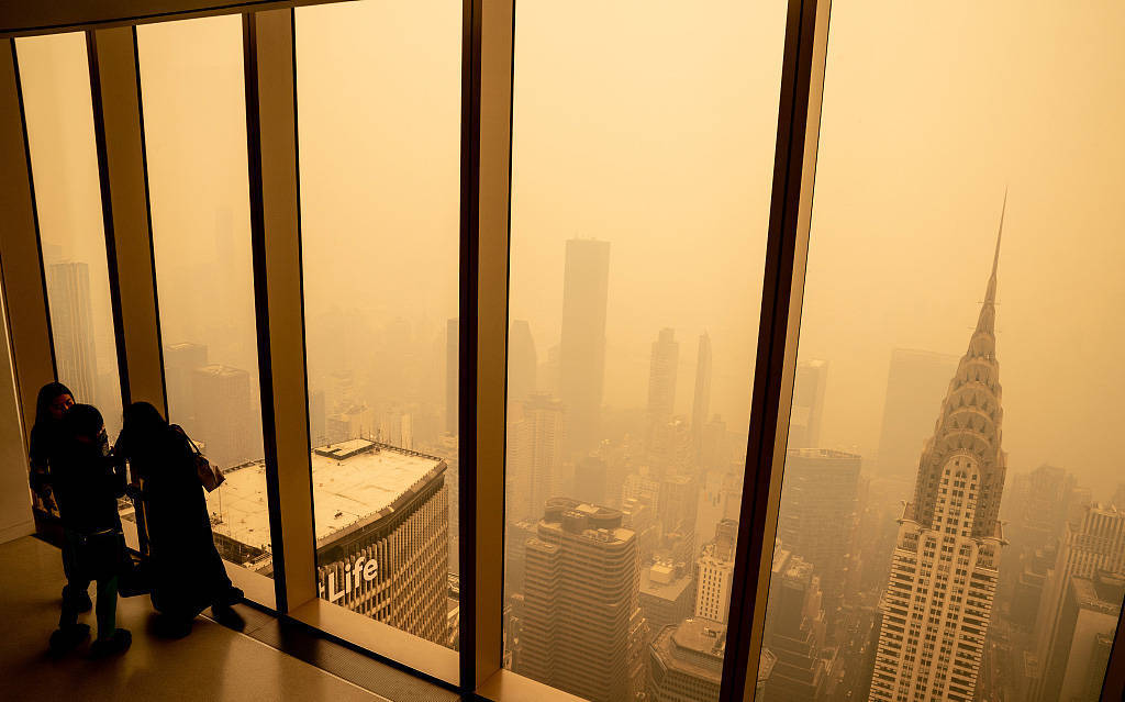 直击｜受加拿大野火烟尘影响,美国纽约被“橙色雾霾”吞没