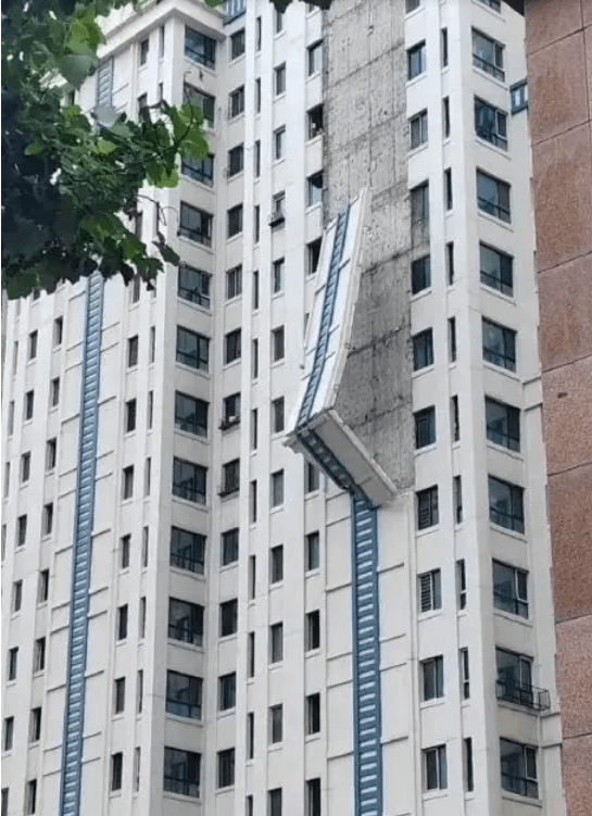 多地高层住宅外墙脱落伤人 谁该担责?