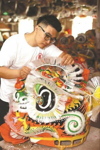 定制的醒狮以醒狮为主题的文创产品钥匙扣文图羊城晚报记者 刘佳宁