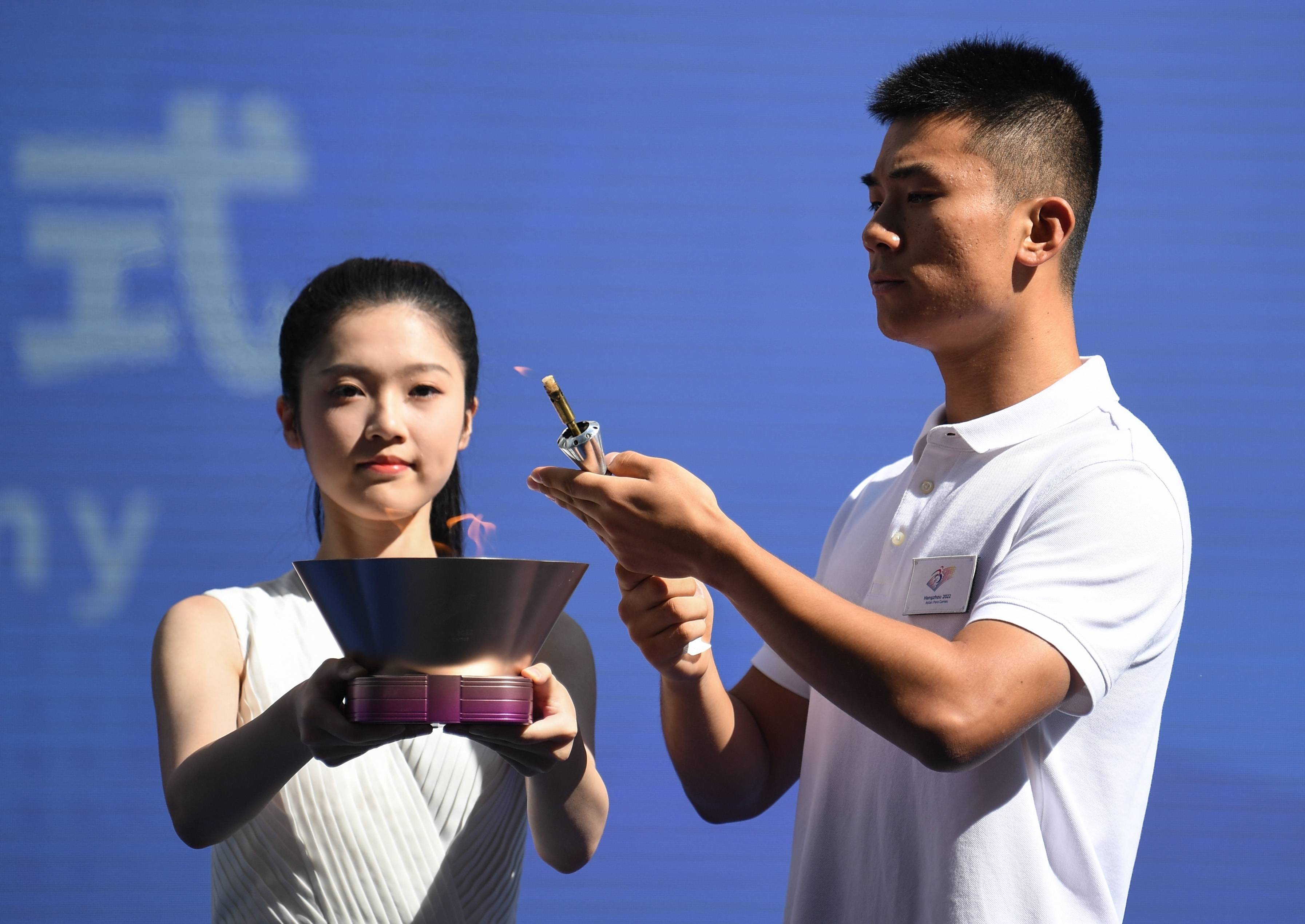 (体育)杭州亚残运会火种在广州完成采集_新华社_仪式_火使者