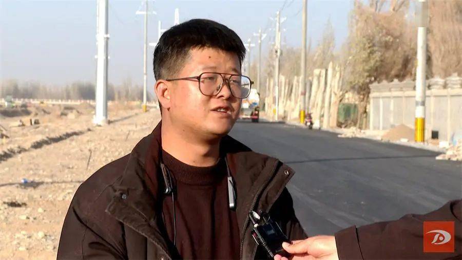 市民张定成说:"现在的路修得又宽又干净,现在这边可以直接到龙德盛,很