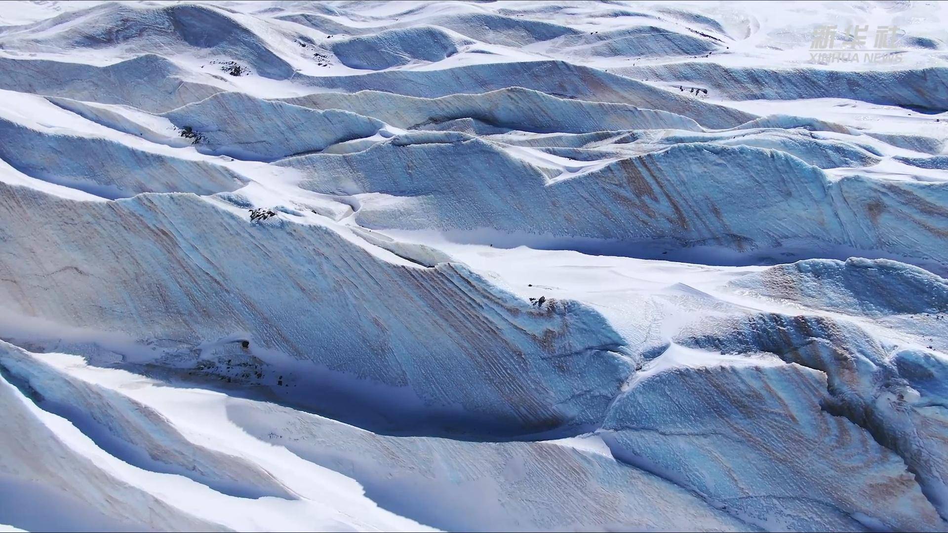 阿尼玛卿雪山海拔图片